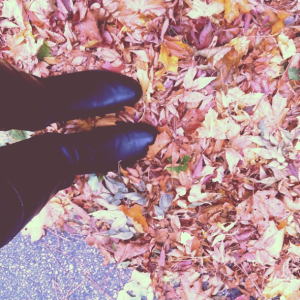 Standing in Fall Leaves